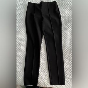 Black stretchy pull on skinny pants, sz 8. New, no tags.